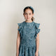 Conj. Blusa Olanes En Talle Azul Y Falda Alforzas Peto Delantero